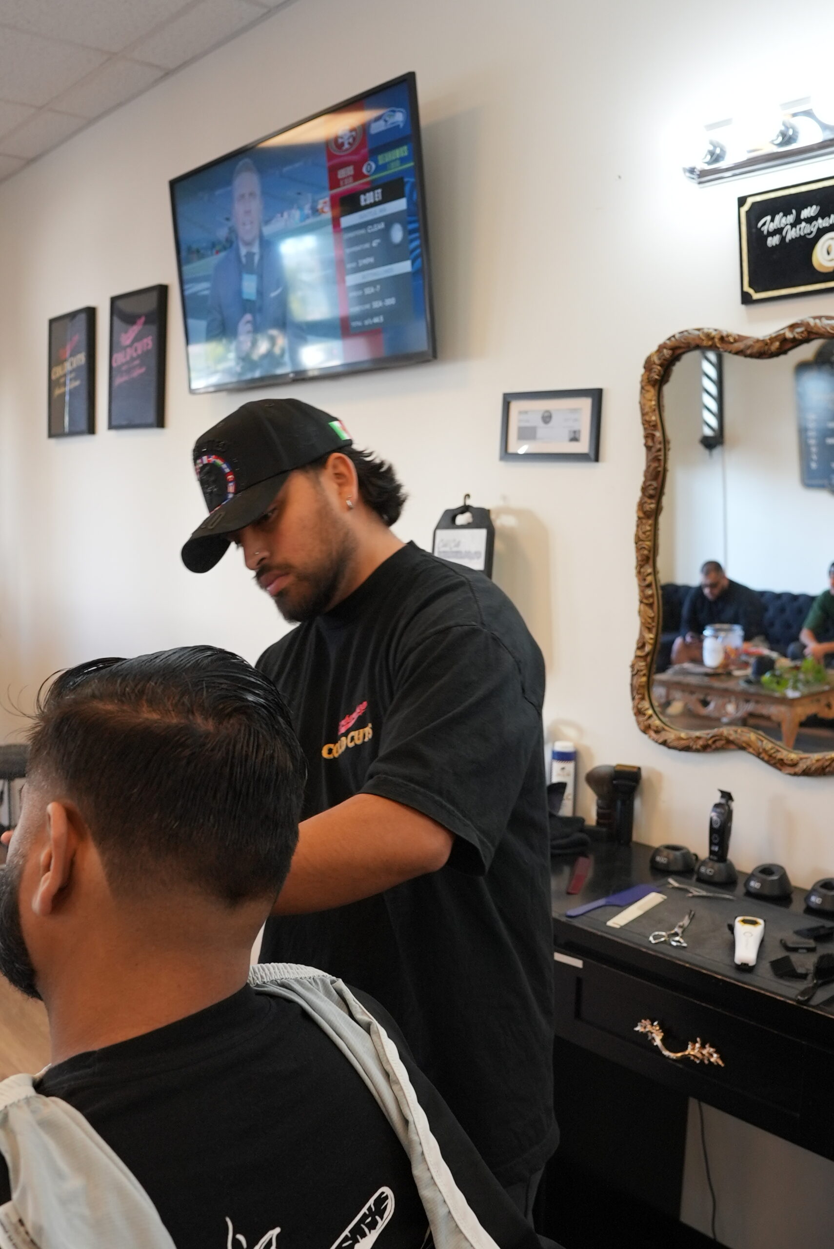 Sergio a.k.a cutzbysizBarber at Cold Cuts Barbershop
